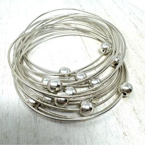 Sterling silver, interlocking wired bangle bracelet with sliding sterling balls